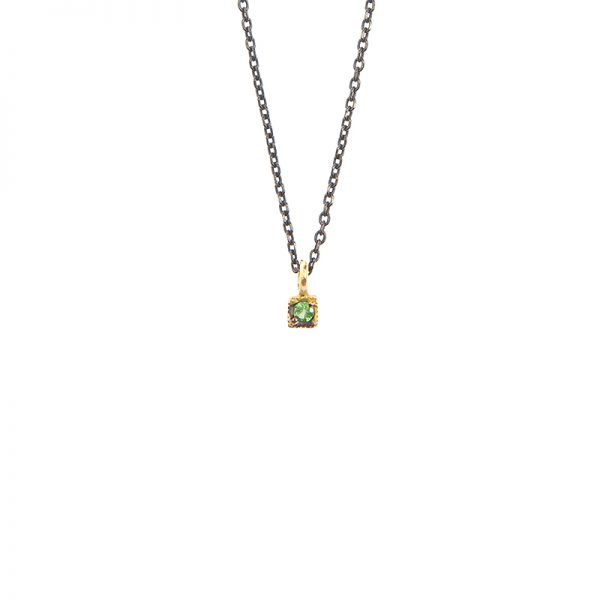 Tiny brigian - Short 18k gold necklace with an emerald, a ruby or a brown brigian. Words cannot describe how its simplicity makes it stand out and catches every look! Material: 18k Gold with an emerald, a ruby or a brown brigian and a silver oxidized chain